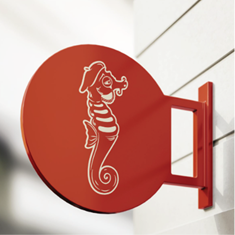 Red circular sign with a white cartoon seahorse wearing a beret and pearl necklace.